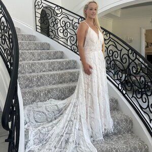 Exquisite white on beige, lace wedding dress